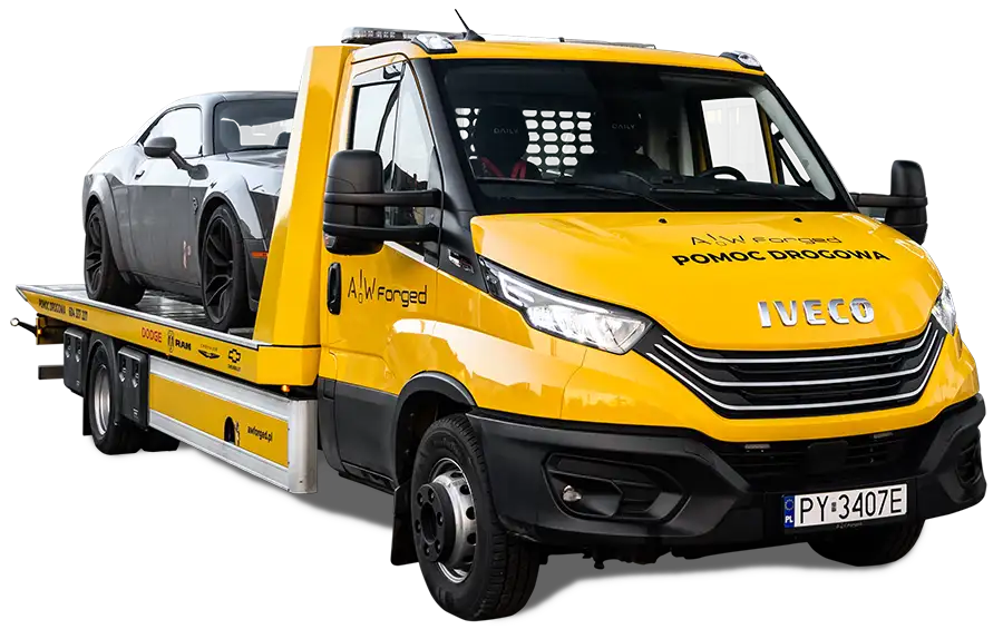 Żółta laweta z Dodge Chellanger